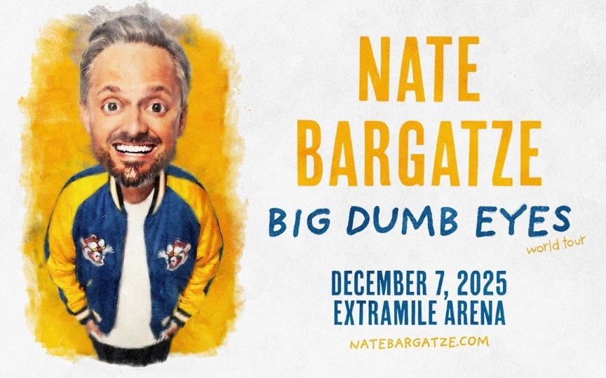 A promotional poster for comedian Nate Bargatze's &quot;Big Dumb Eyes World Tour.&quot; It features a cartoon-style portrait of Nate Bargatze with an exaggerated smile and wide eyes. He is wearing a blue and yellow varsity-style jacket with cartoon animal patches. The text reads &quot;NATE BARGATZE - BIG DUMB EYES world tour&quot; at the top, and &quot;December 7, 2025 - ExtraMile Arena&quot; at the bottom, with the website &quot;NateBargatze.com&quot; below. The background is white with yellow watercolor-style accents.